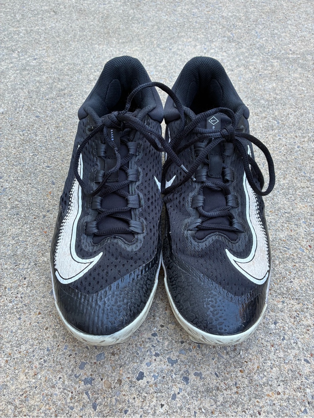 Nike Black Molded Baseball Cleats with White Swoosh